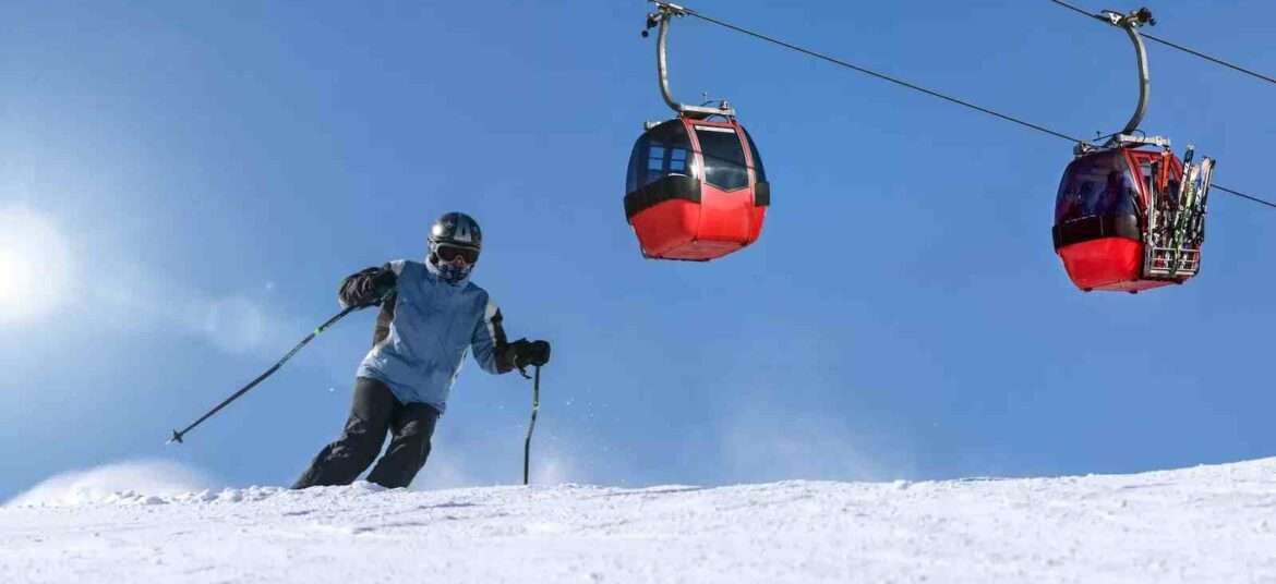 Person Riding Ski on Snow Field skiing in Gulmarg- Kashmir cab service