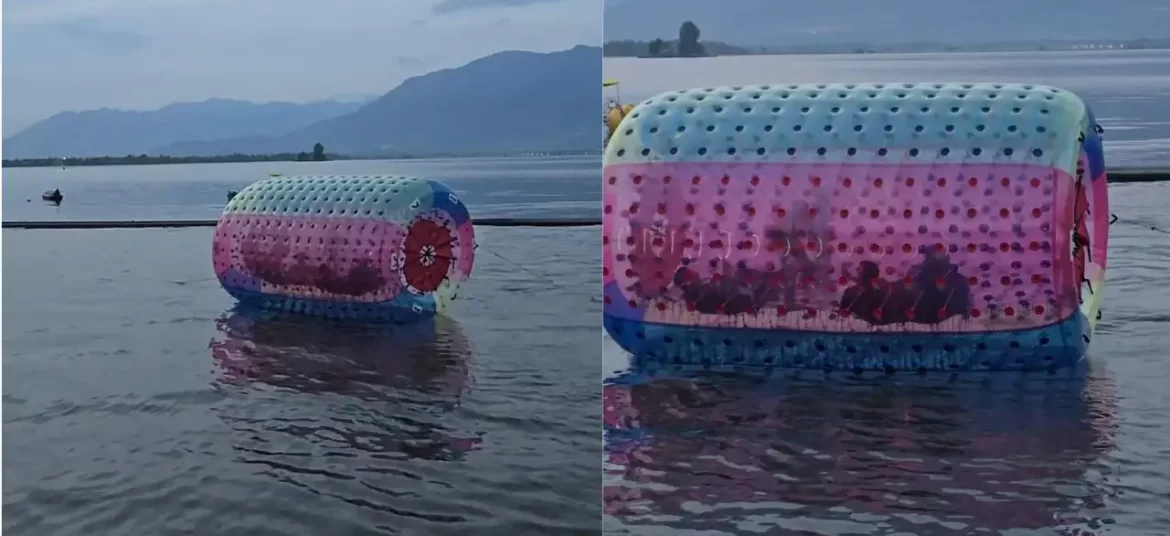 Tourists enjoying water zorbing fun activity in dal lake Srinagar